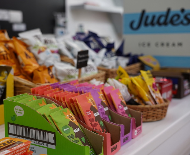A selection of snacks available in the café, including packets of crisps and chocolate bars