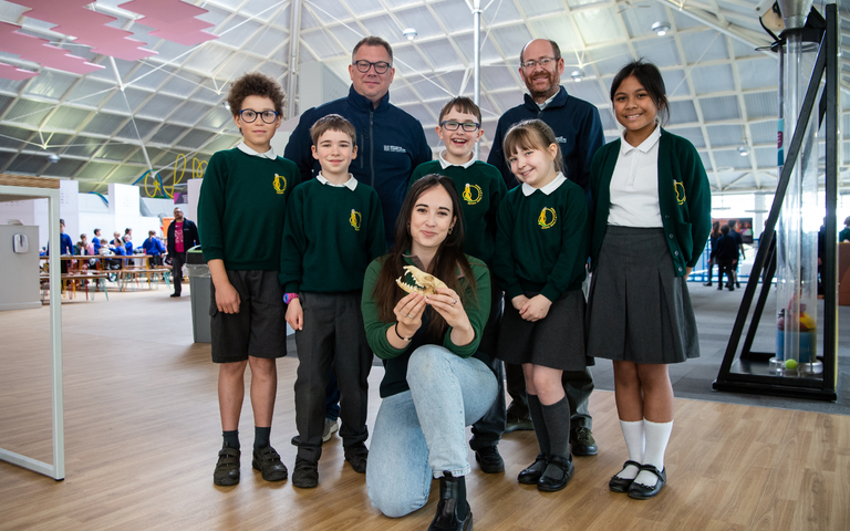 TV presenter Megan McCubbin poses with some school children at Winchester Science Centre