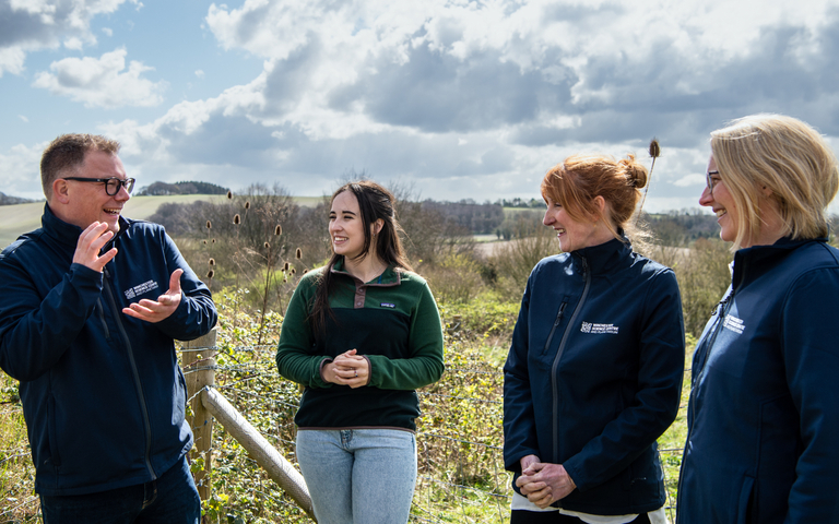 TV presenter Megan McCubbin talks to members of staff from Winchester Science Centre outside