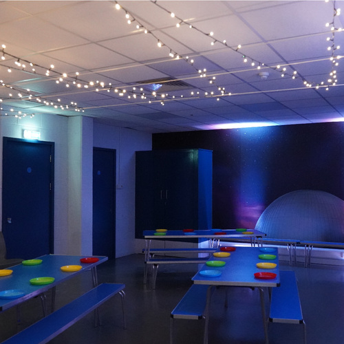 One of the birthday party rooms, decorated with fairy lights
