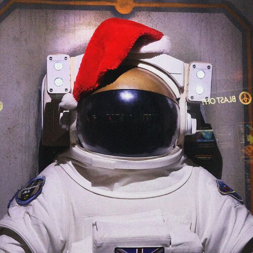 A spacesuit with a Santa hat on it's helmet