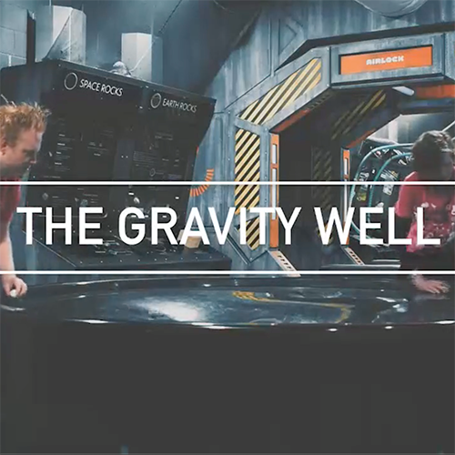 Interactive science exhibition photo showing the Gravity Well exhibit
