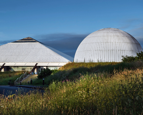 The Science Centre and Planetarium buildings with blue sky behind