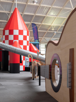 A giant guitar and red and white rocket